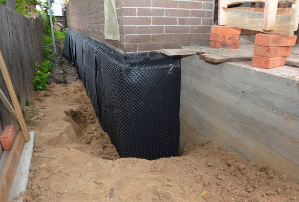 Happy homeowners after waterproofing job in Farmersville Station